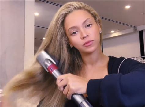 Beyoncé flaunts long natural hair in new Cécred video .